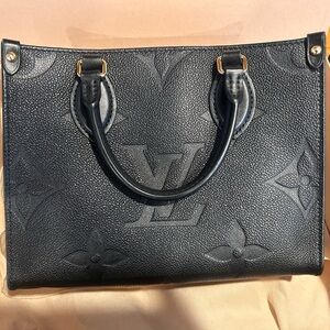 Louis Vuitton Leather with Monogram